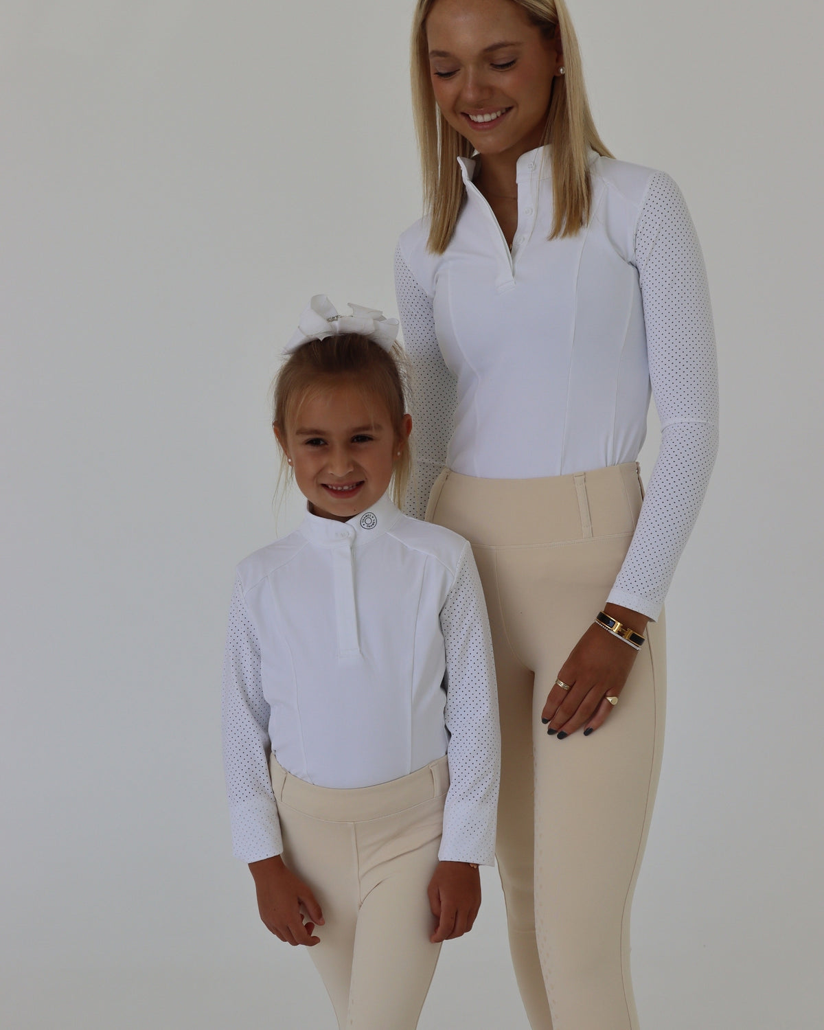Child and adult in London Show Tights in Creme